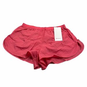NWT Lululemon Dolphin-Hem Mid-Rise Running Short 3"
(Desert Red) Size L